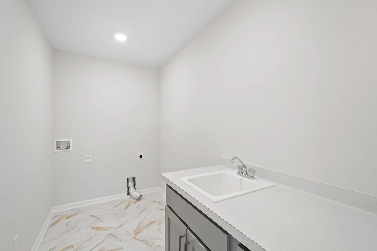 Enjoy added functionality in the laundry room with a built-in sink, ideal for hand-washing delicates or tackling tough messes!