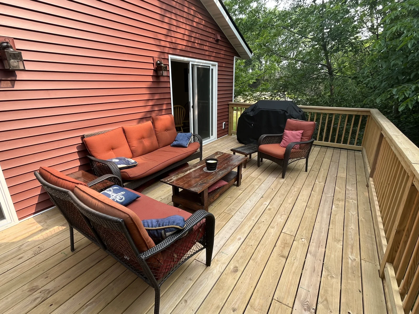The house has a deck attached to the back.