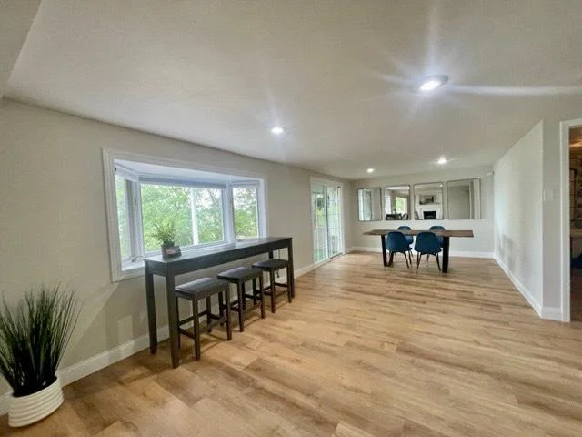 10-Dining area 2 walks out to covered lakeside patio (2).jpg