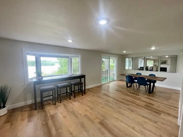 10-Dining area 2 walks out to covered lakeside patio (1).jpg