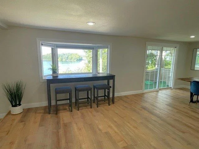 10-Dining area 2 walks out to covered patio on lakeside (2).jpg
