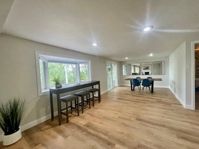 10-Dining area 2 walks out to covered lakeside patio (2).jpg