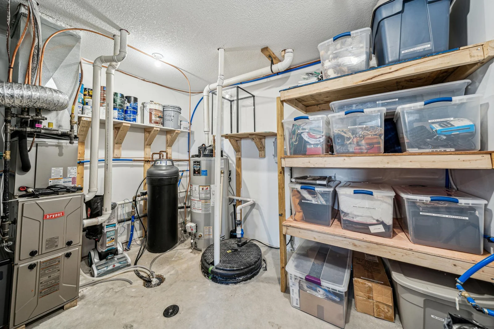 Utility/Mechanicals room with plenty storage