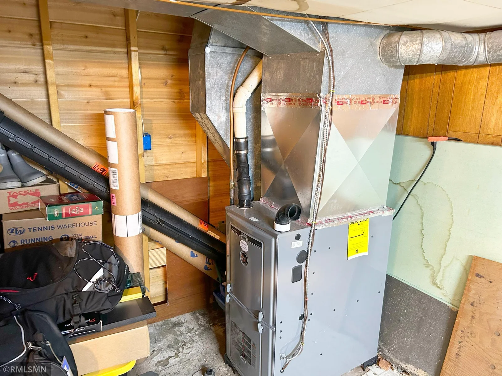 Furnace in utility room off of lower level bathroom.