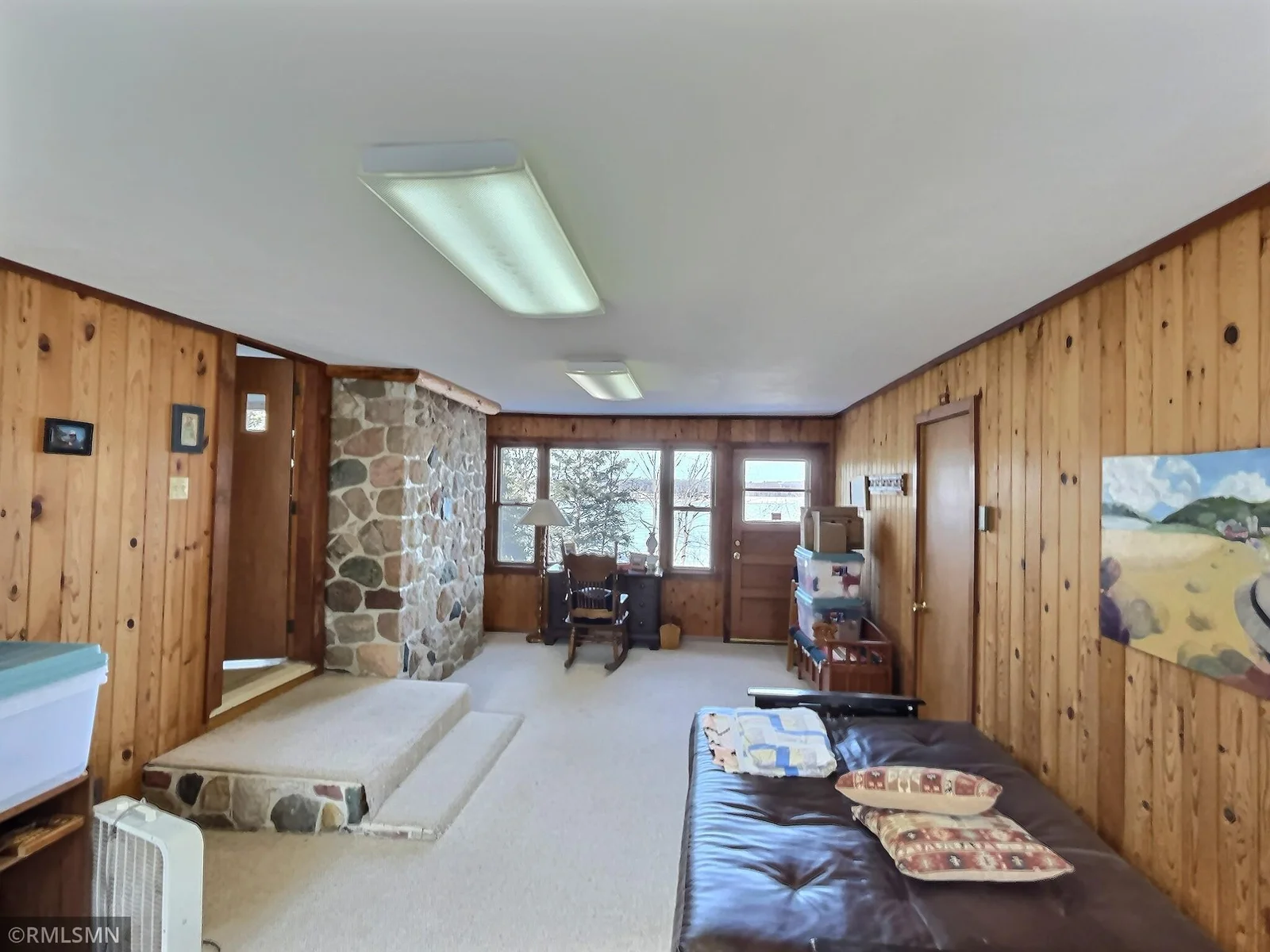 As you come in from double garage, you can spend spend some time in this oversized four season breeze-way.