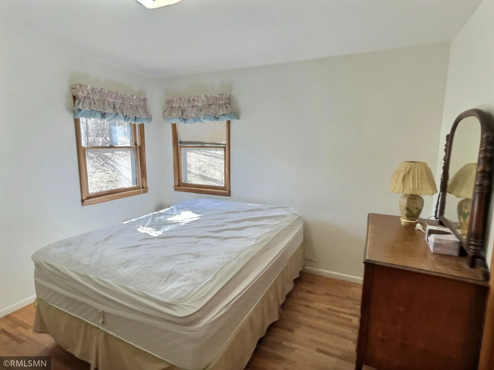 This shows one of the nice size bedrooms on main level.