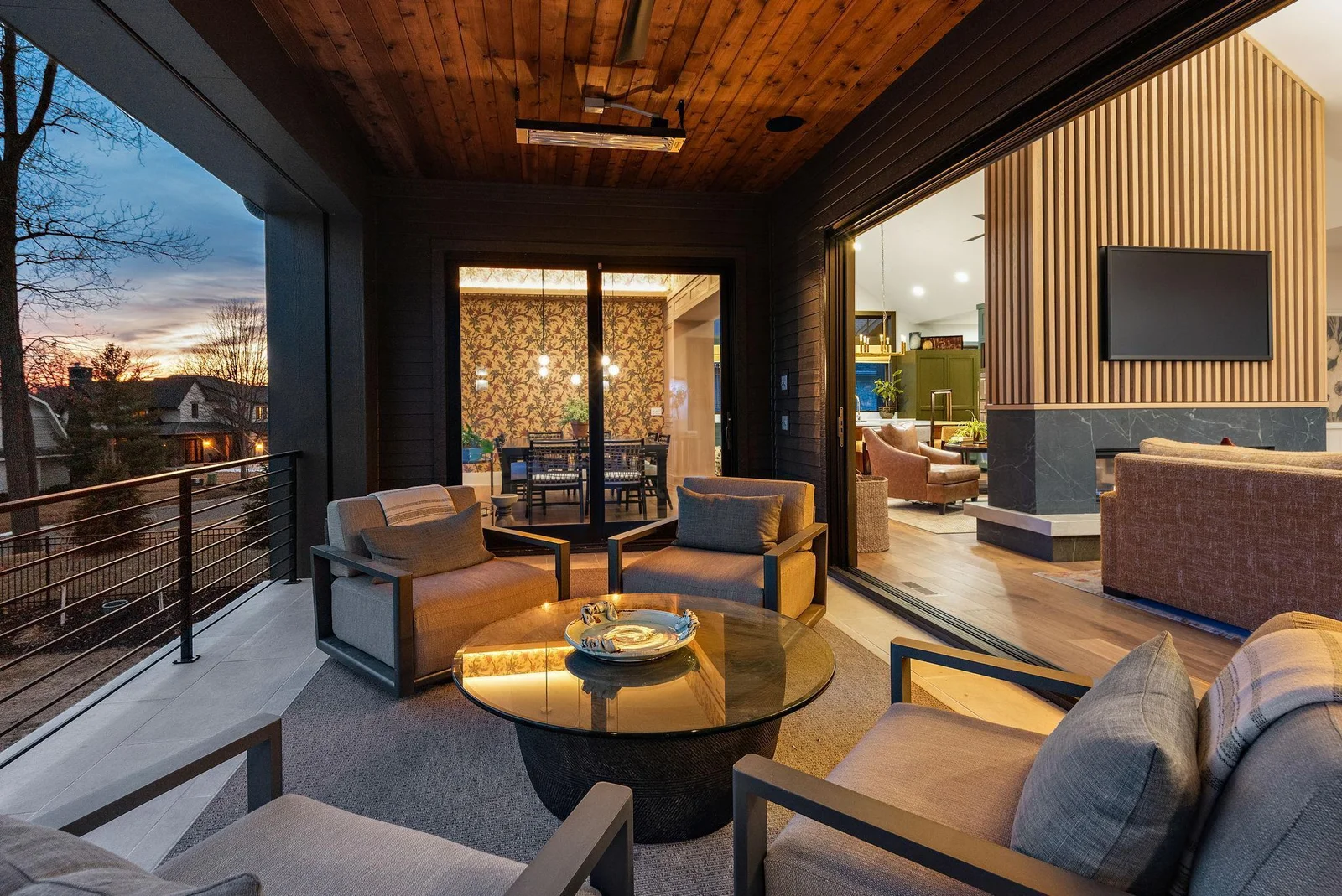 Entertain nearly all year round on the heated, covered terrace with remote control phantom screen & 5-panel bi-folding stackable door system - the ultimate indoor/outdoor entertainment space. Terrace is 13' x 24'.