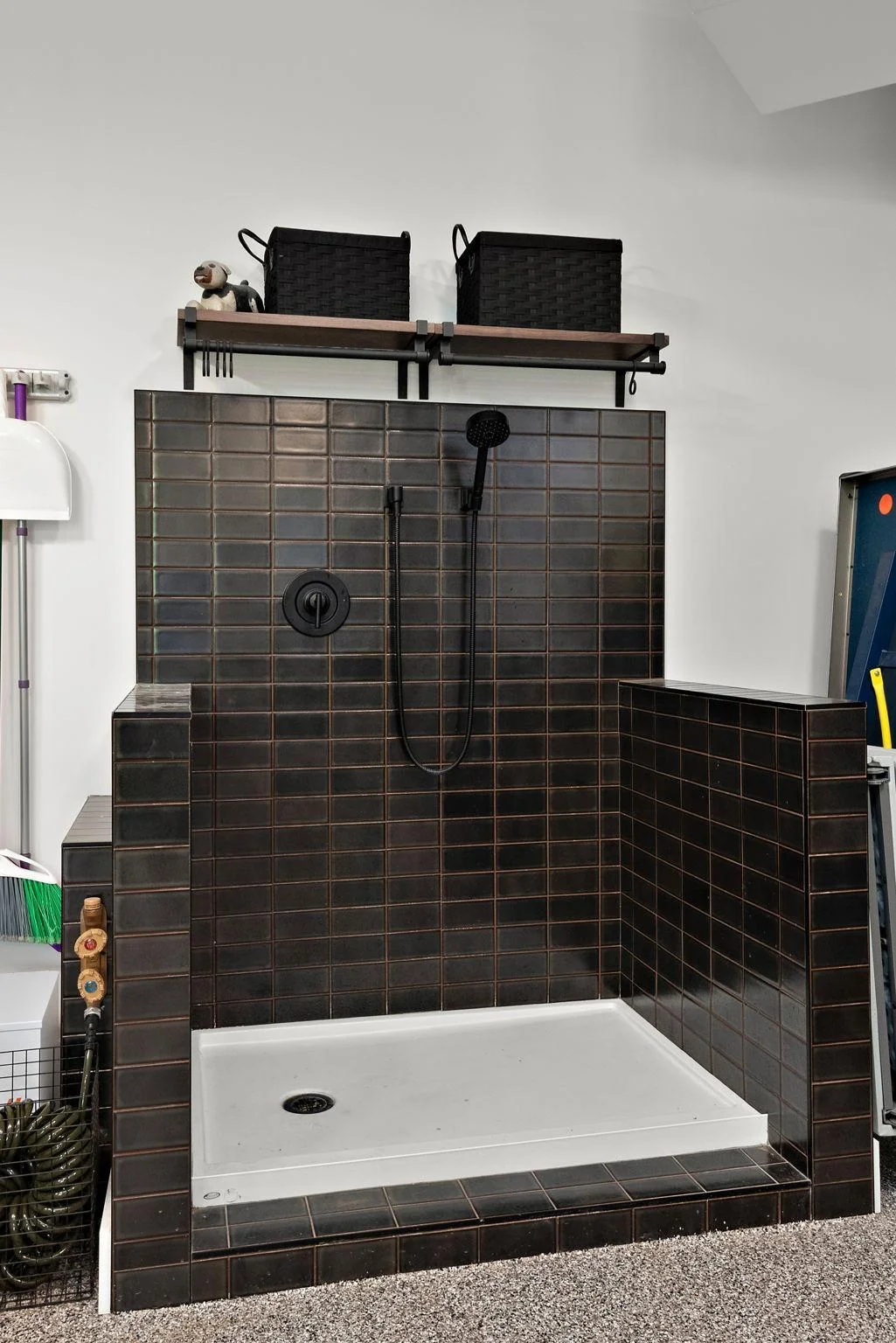 Of course the walk-in pet wash has both hot and cold water, tile surround, and handheld shower head - great for your four legged; heck, two legged mischievous, free-spirited loved ones.