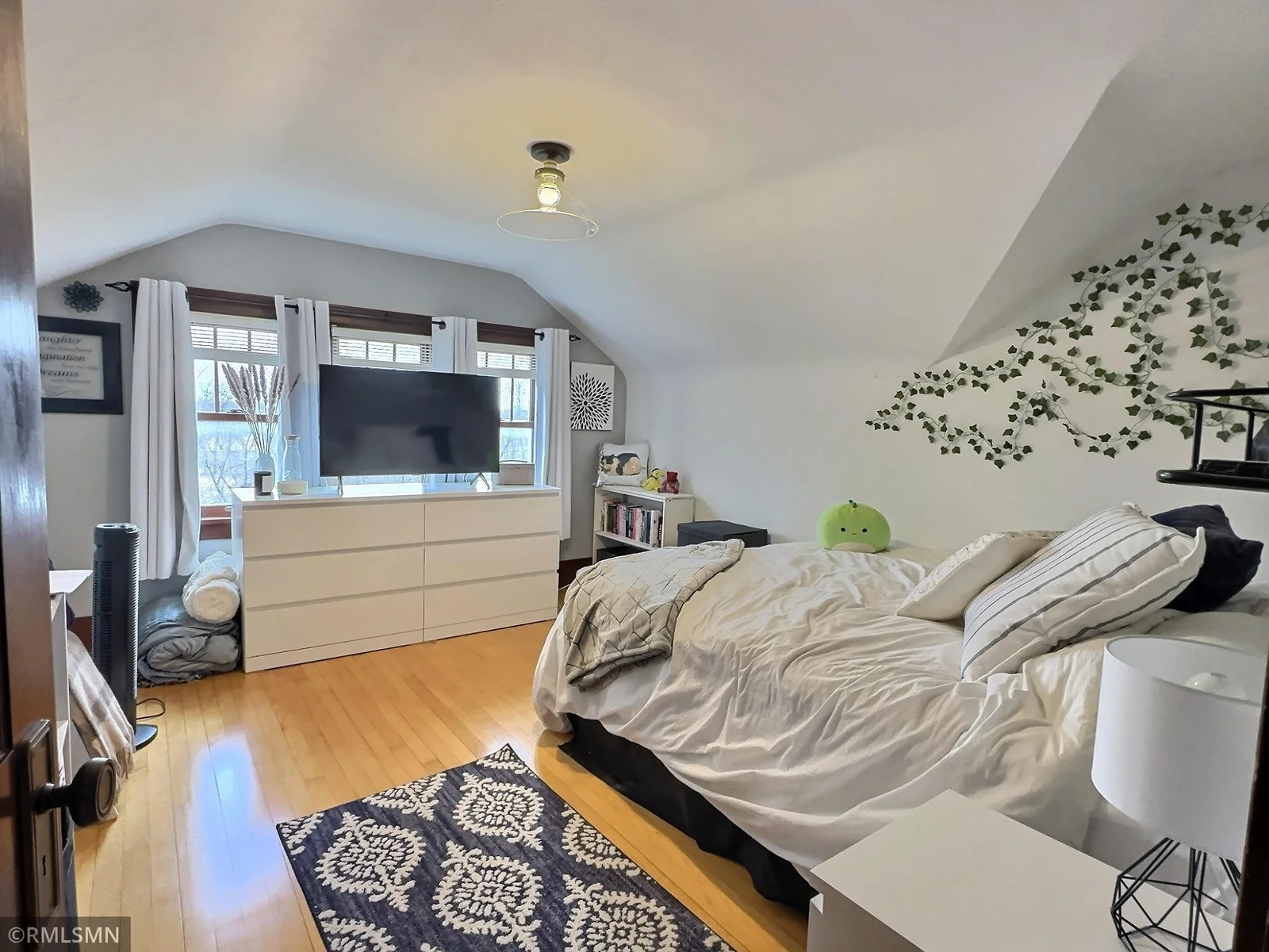 Fourth bedroom is on the second floor. Big windows allow a lot of natural light to keep things bright.