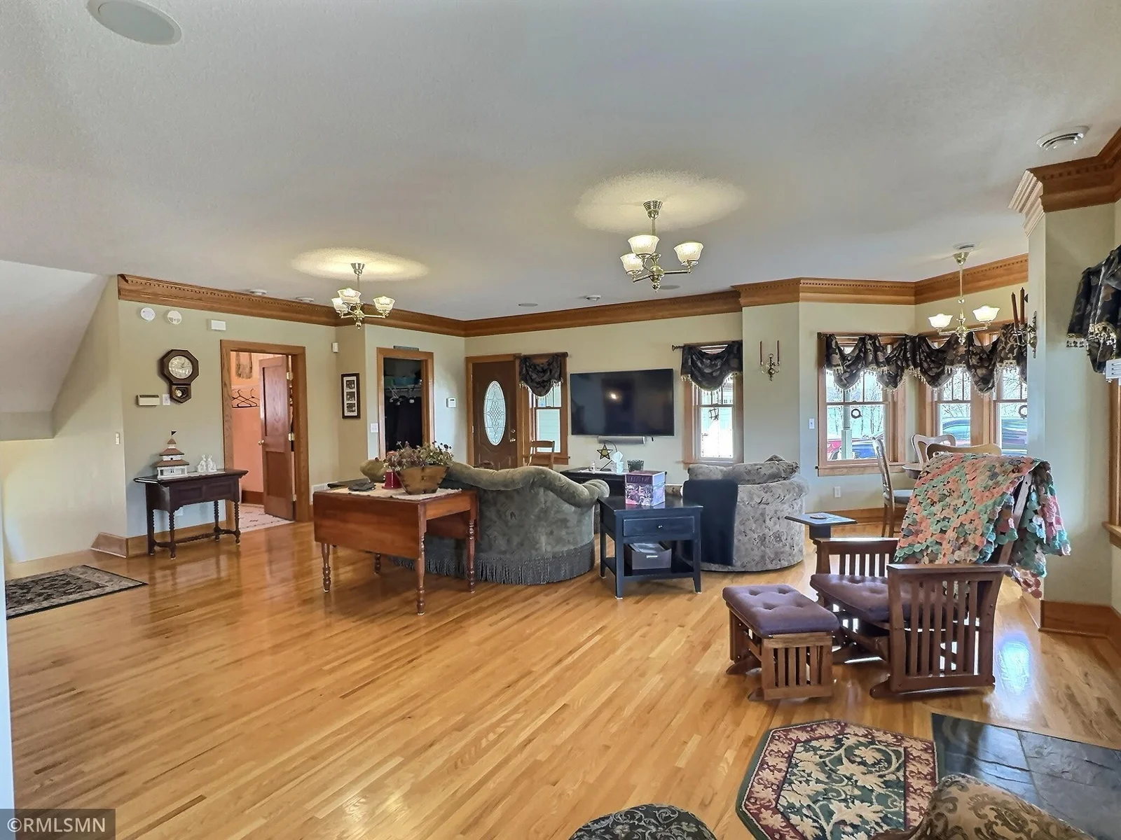Beautiful hardwood floors in the addition, custom-made and special ordered to match the original home.