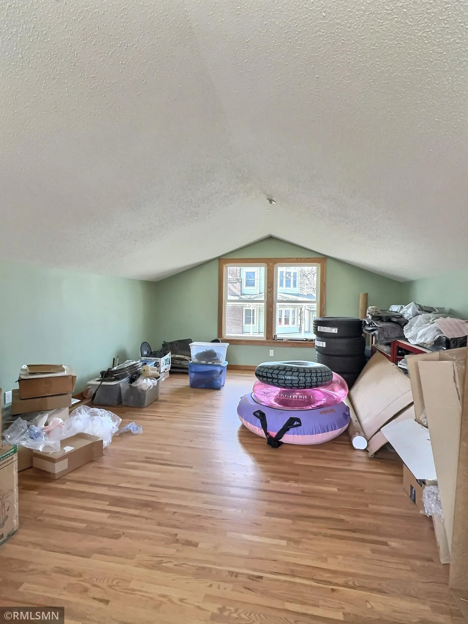 This is the loft in the garage/shed, finished with hardwood floors. Great play area or get away!