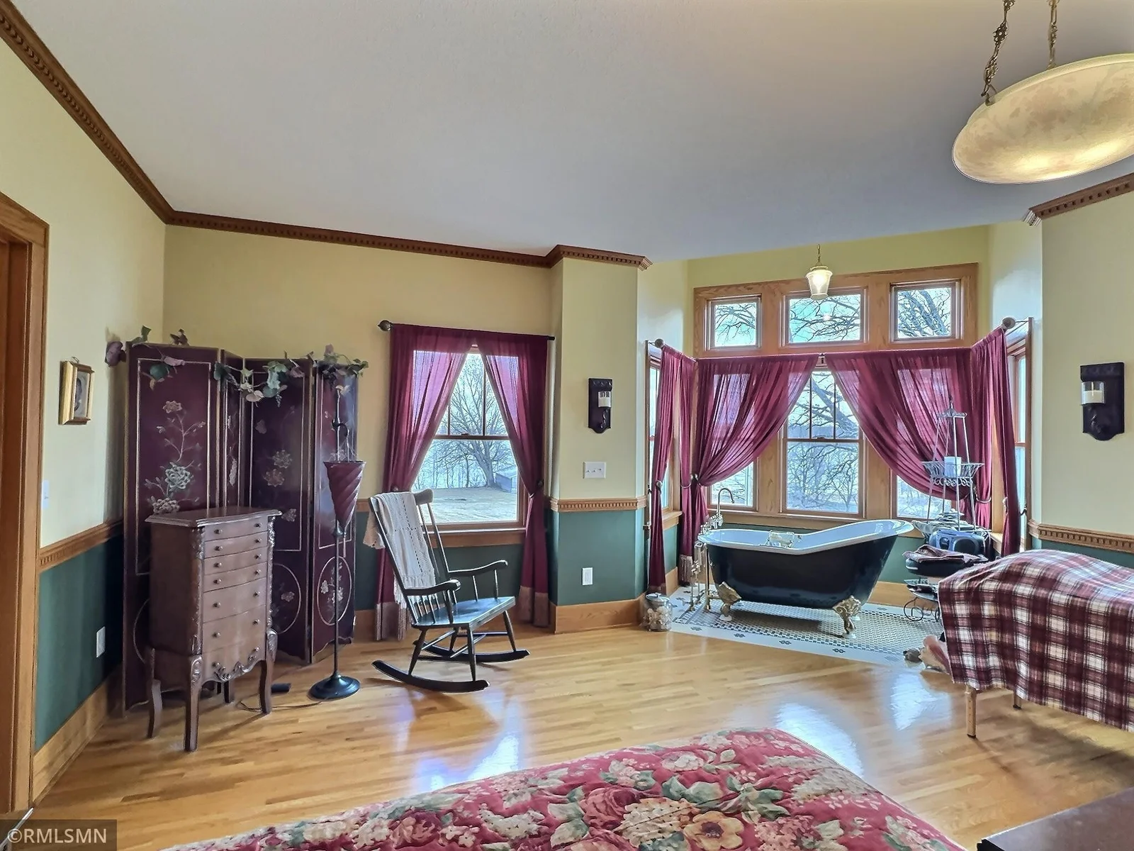 Primary suite is very spacious, and has great views looking out to the lake.