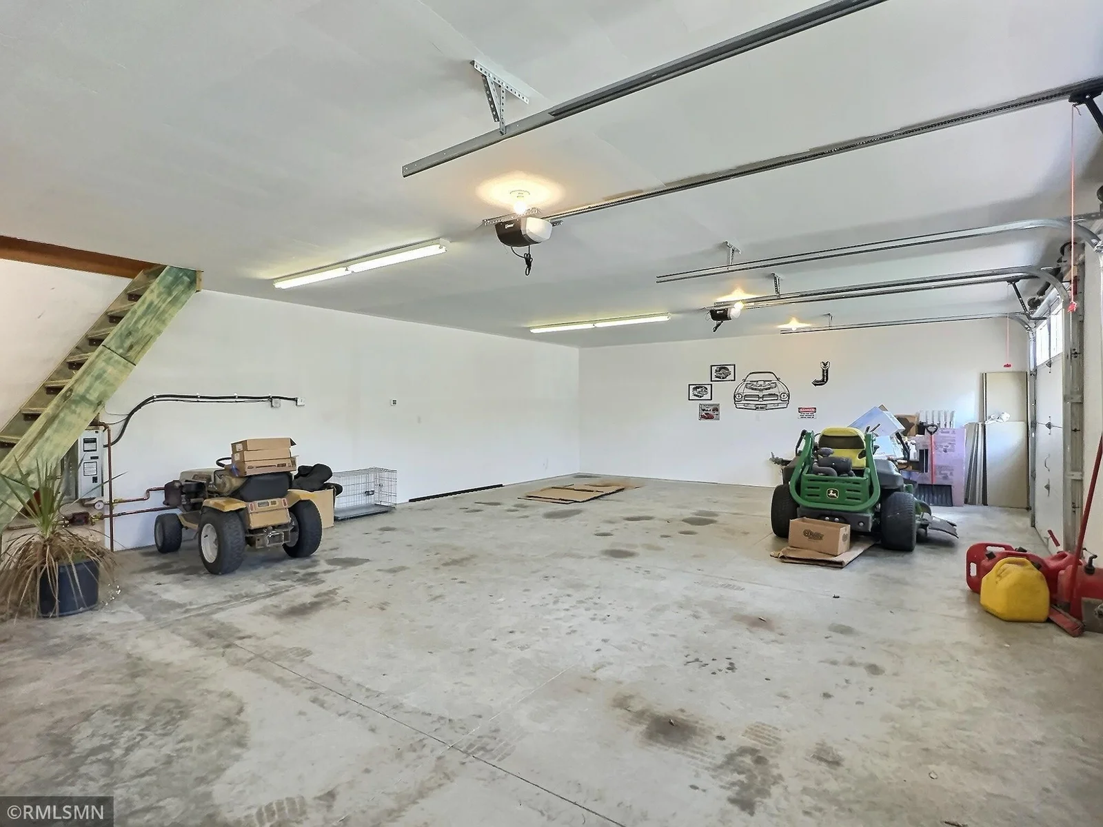 Inside the garage is heated with in floor heat and 3 oversized stalls.
