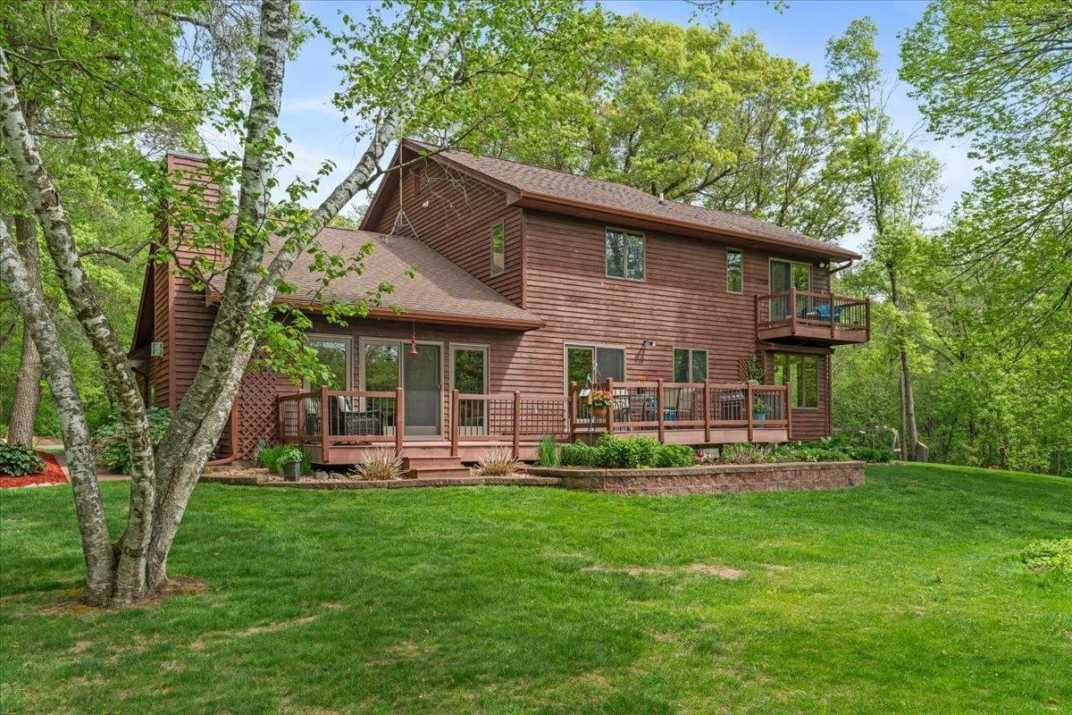 Back of home where you can sit and relax on the deck