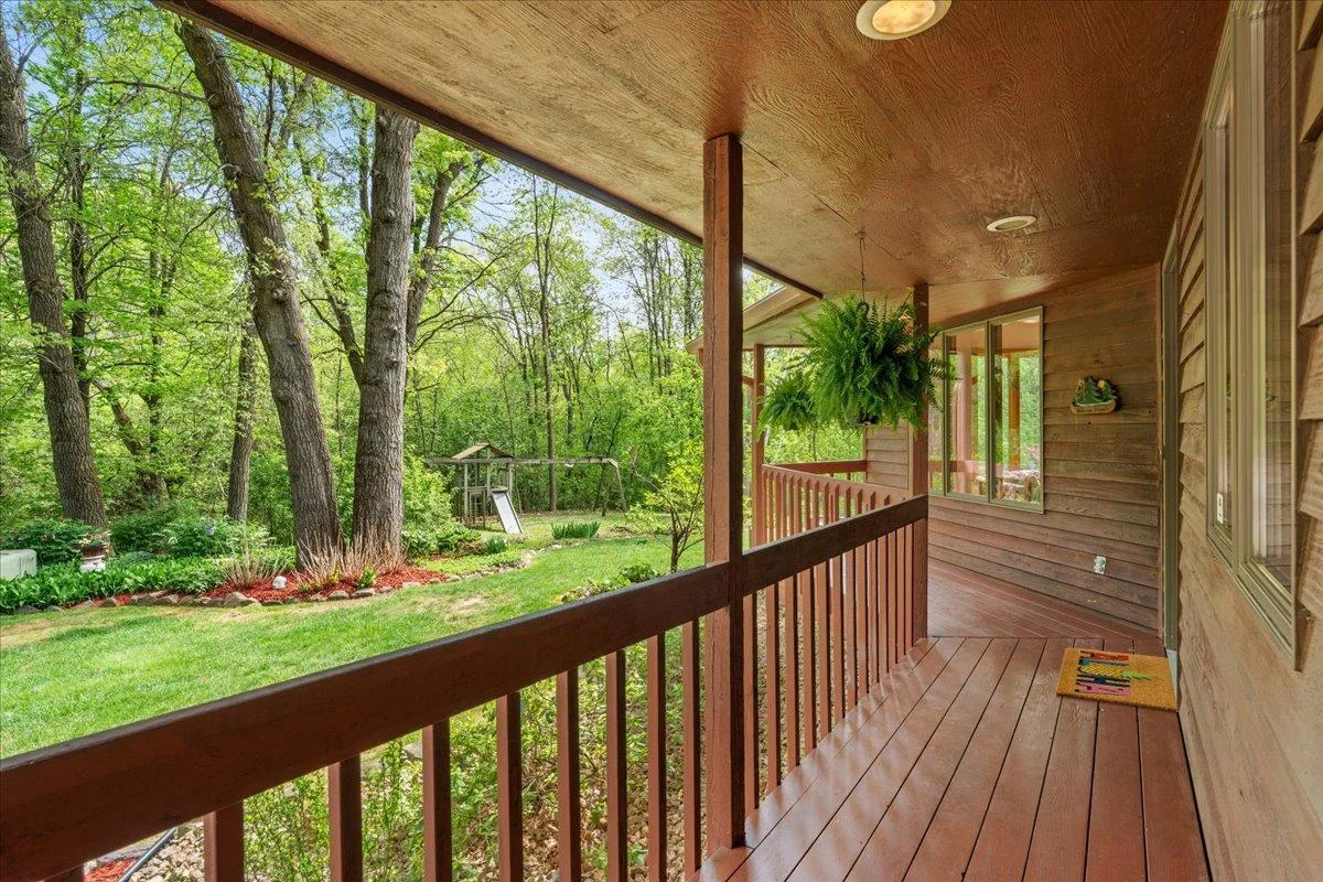 Covered porch and the entry of the home