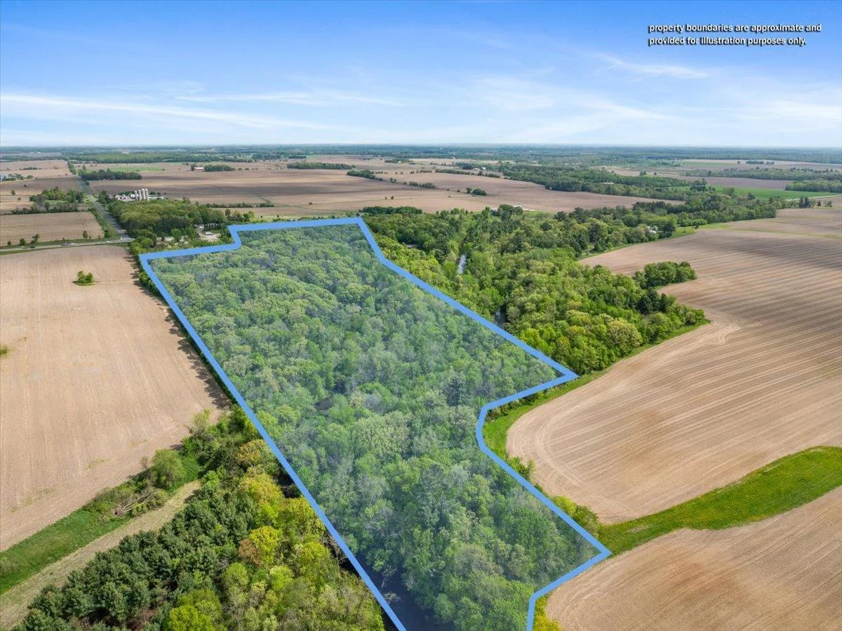 Lot line overview is approximate. There is land on both sides of the river.