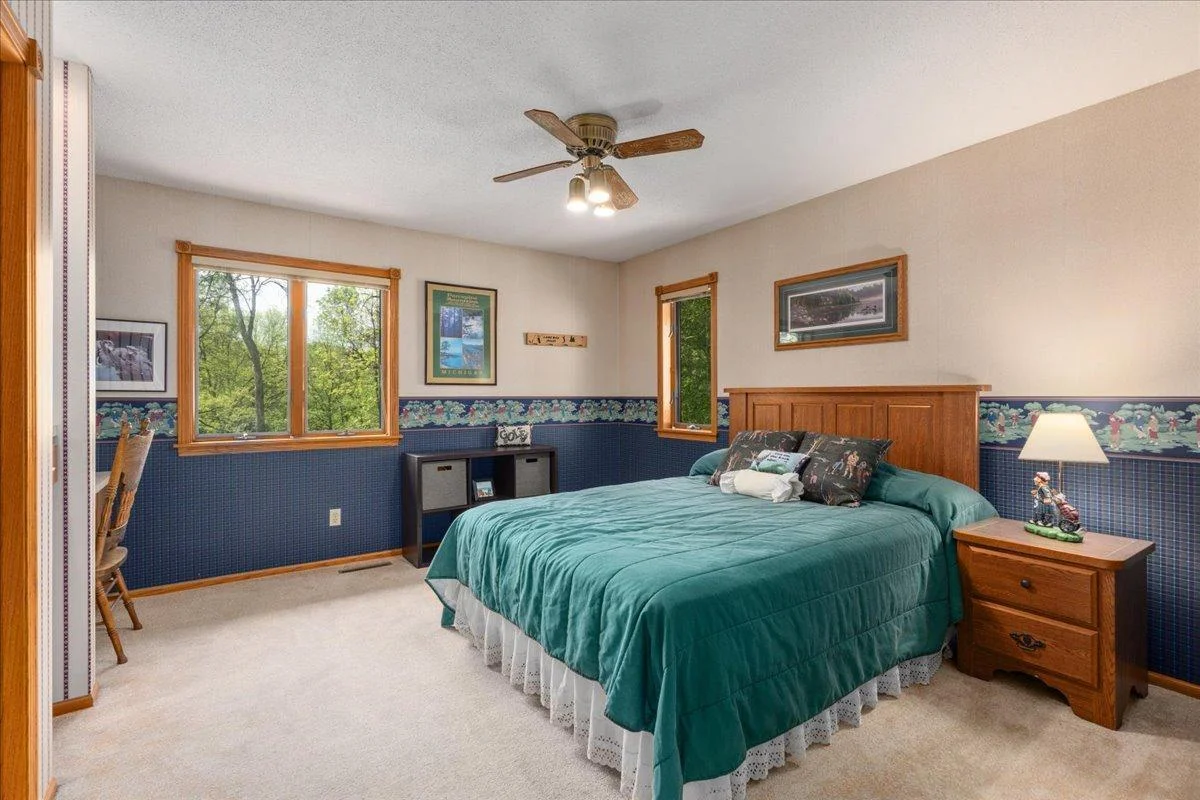 Upper level bedroom with great windows