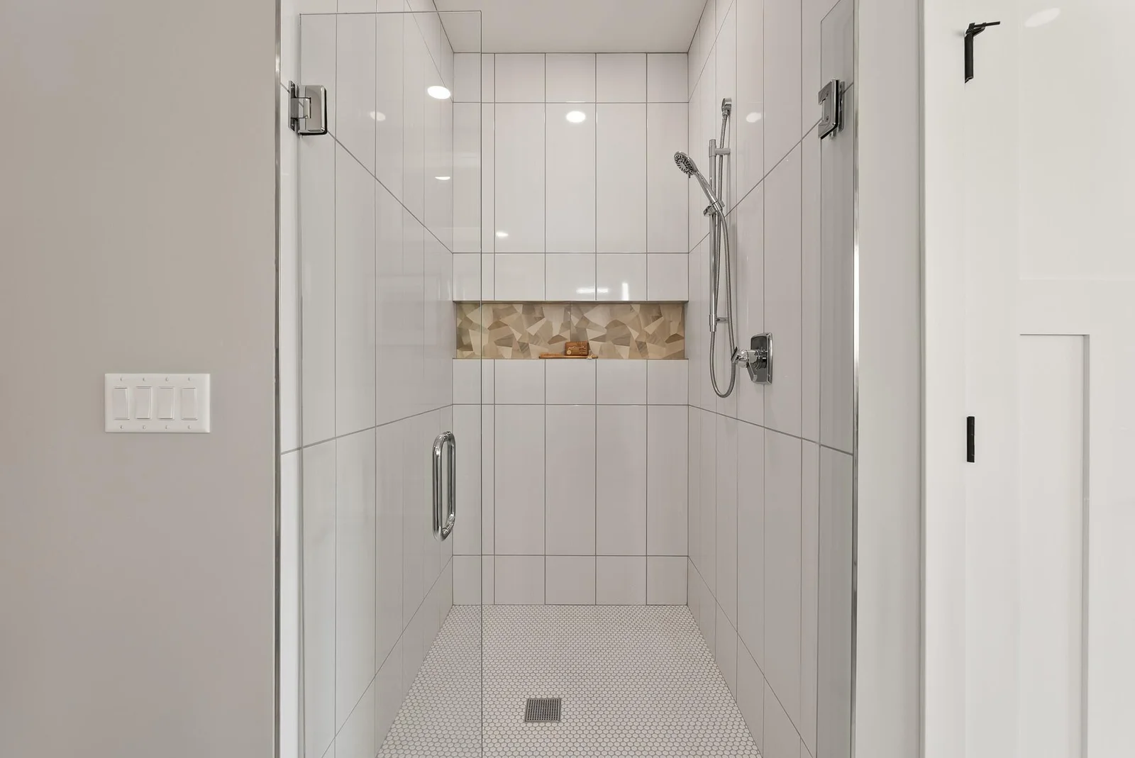 Master Shower with custom tile inset
