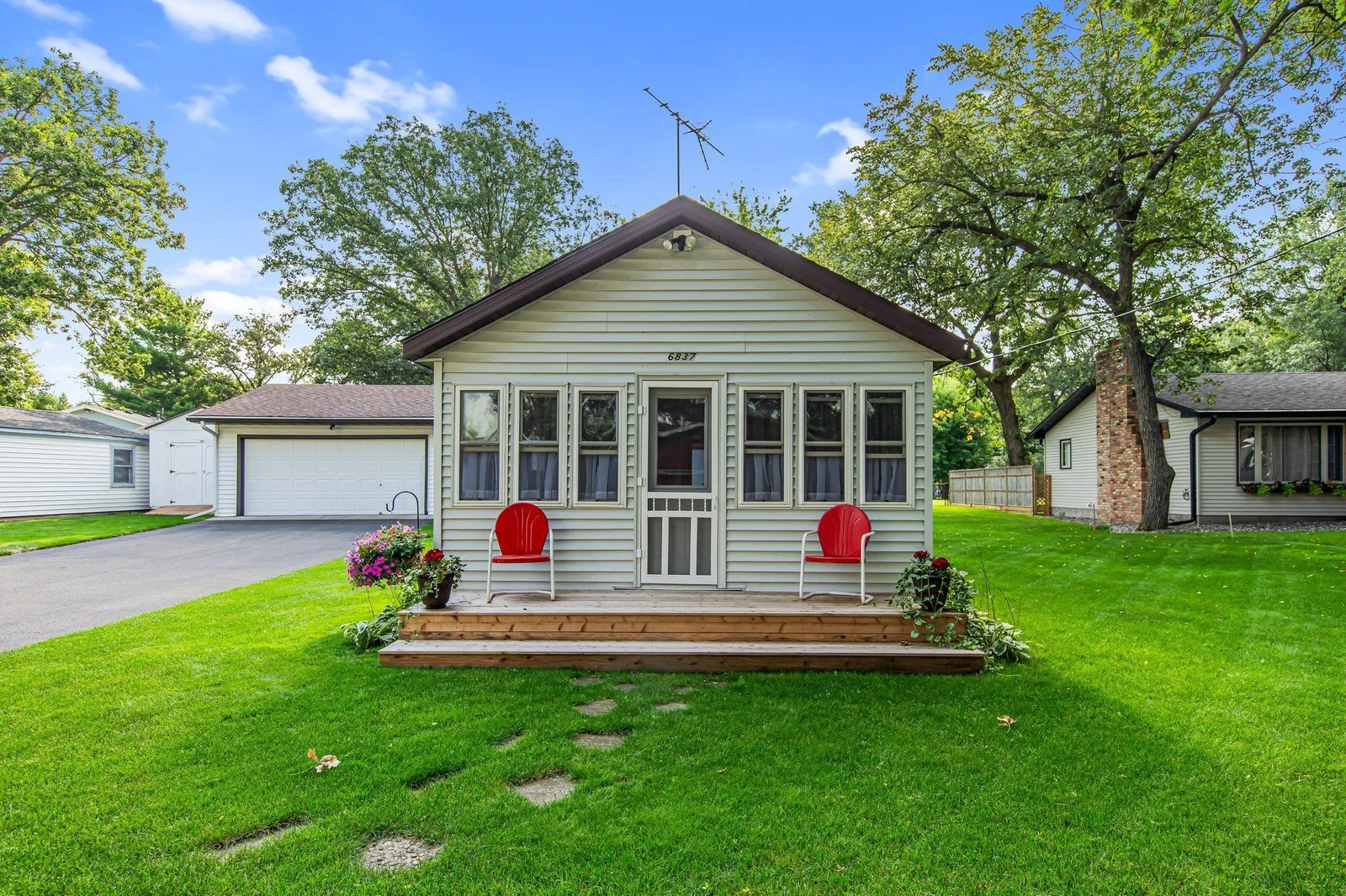 Bunkhouse, detached garage, & storage shed across street from from the main home!