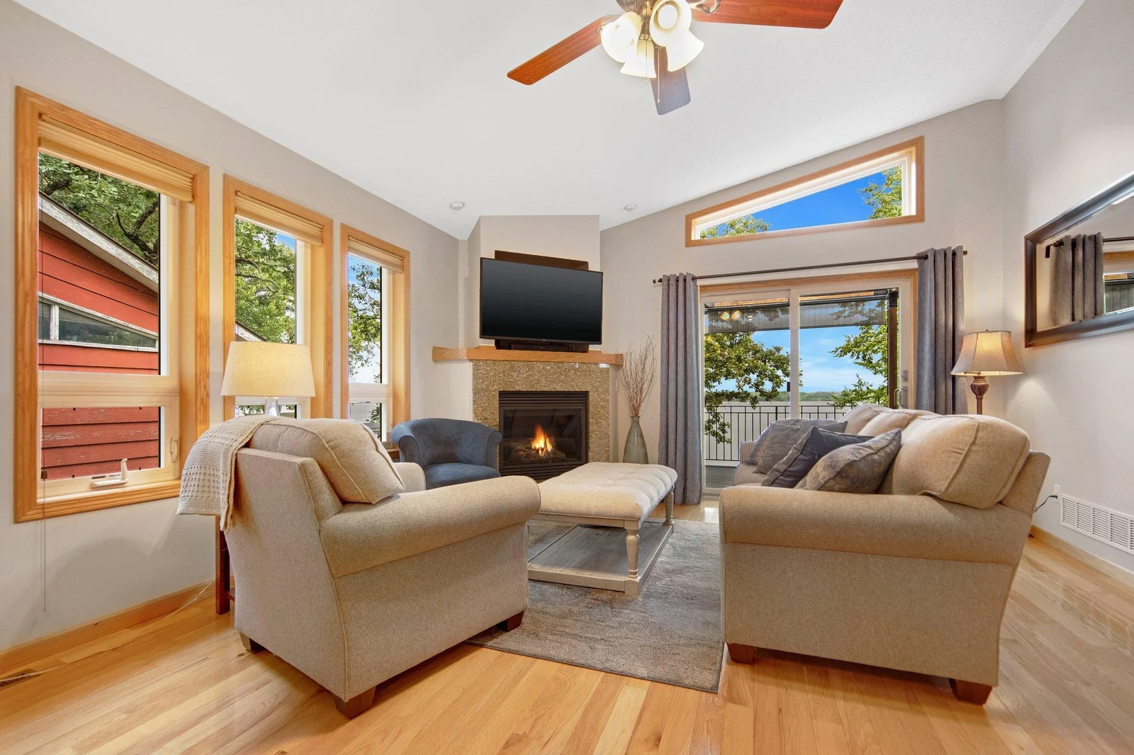 Living room with gas fireplace and walks out to the large deck.
