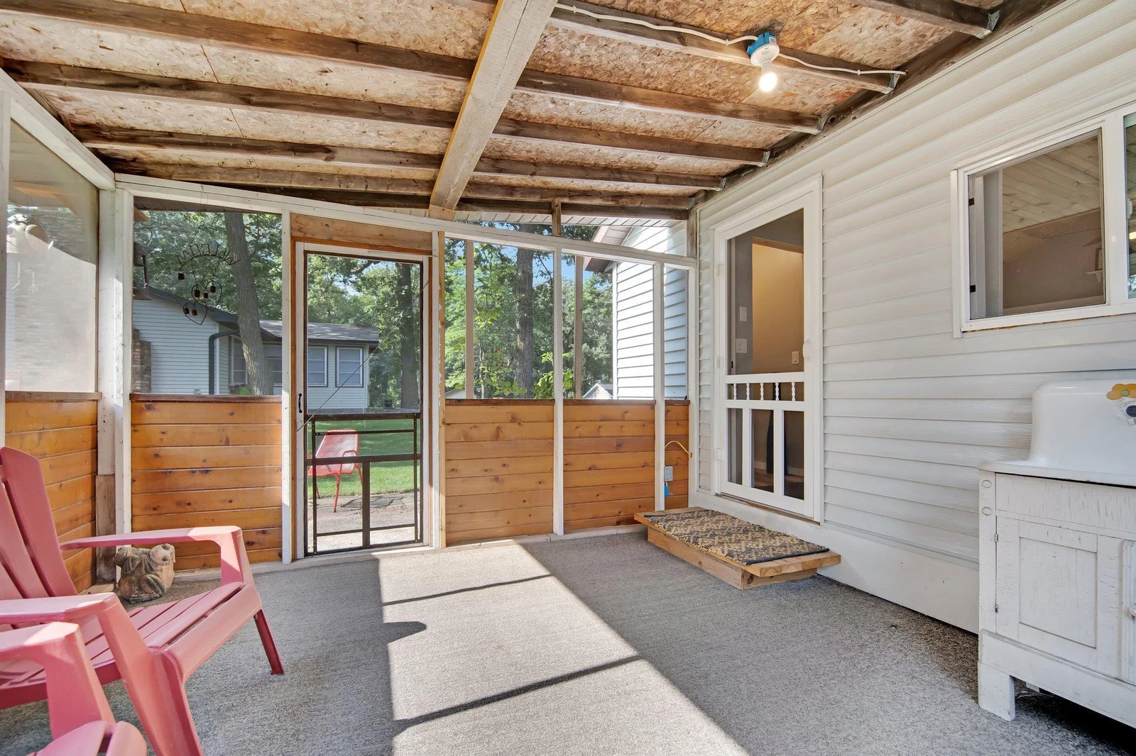 Screened porch on bunk house.