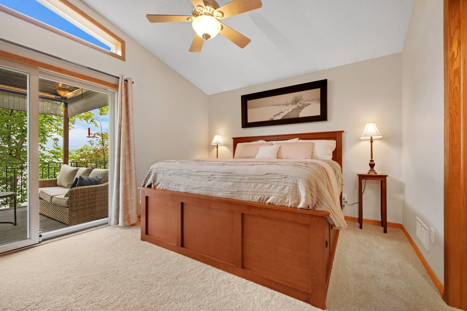 Main floor primary. This bedroom also walks out to the deck overlooking the lake!