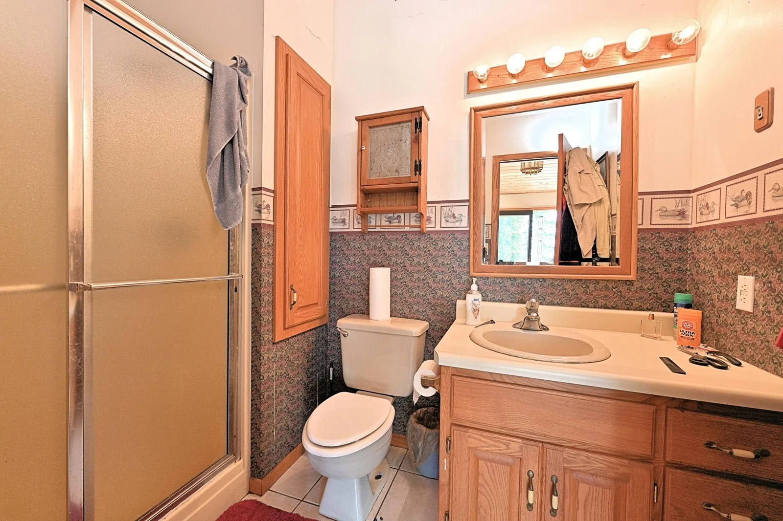 BATHROOM OFF OF LIVING ROOM
