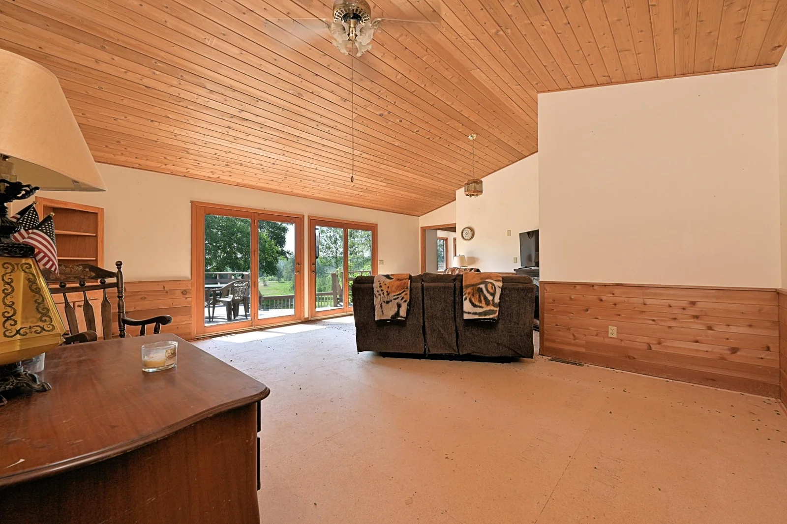 LIVING ROOM IS JUST STEPS AWAY FROM THE DECK