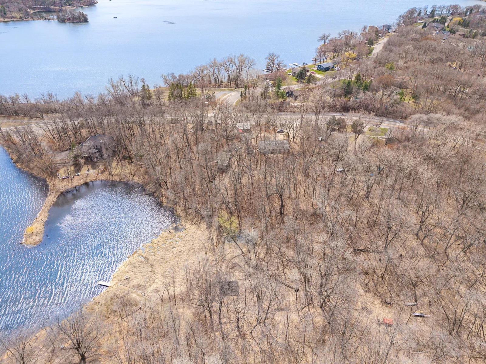 Kingsley Lake on the lower left and Orchard Lake on the top left. The buildings you see in the center are the property