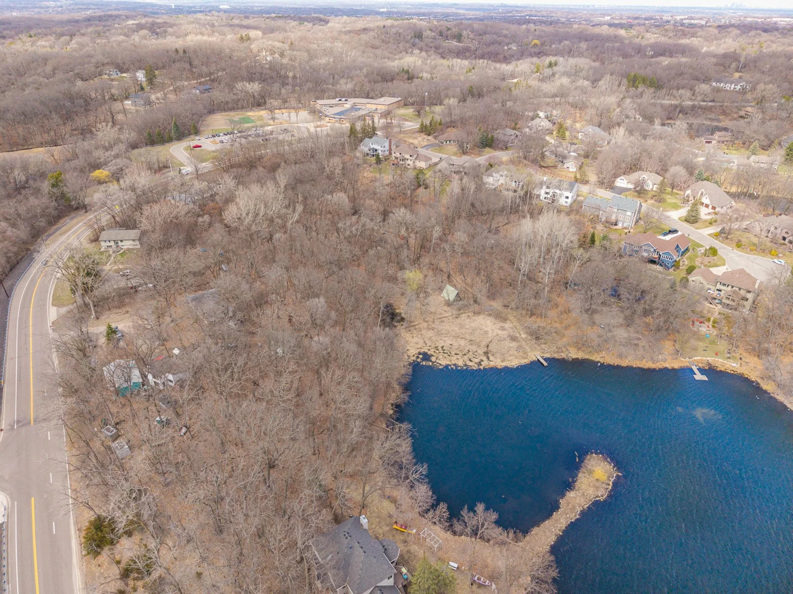 Picture of the property with the blue shed and view of Kingsley Lake