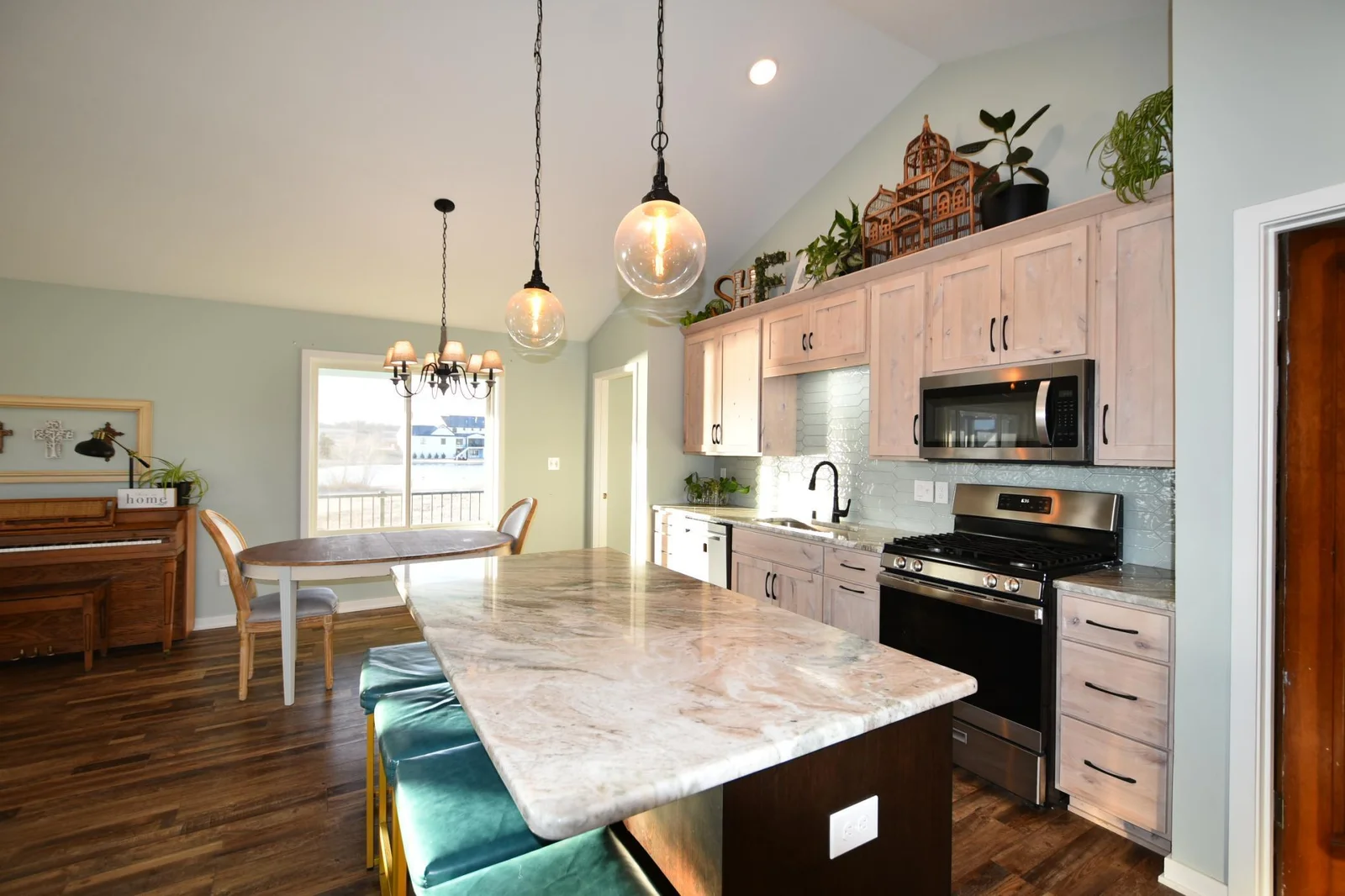 Large center island with cherry cabinetry & granite