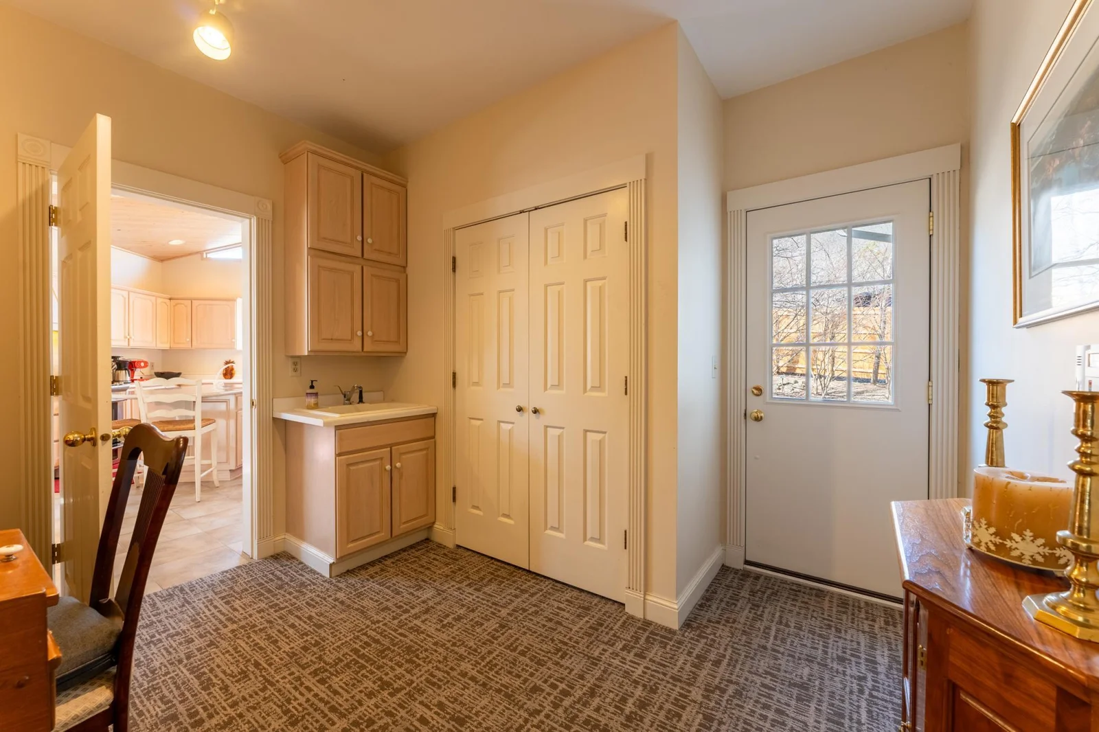 Mudroom with Storage Closet and Sink