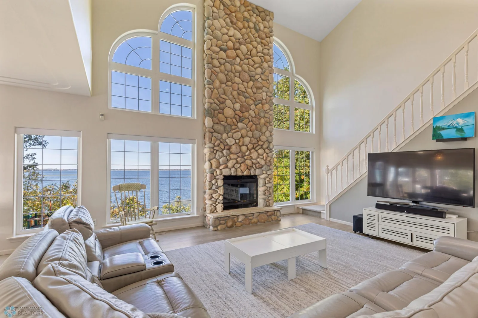Double Volume Living Room with Stunning Lake Views