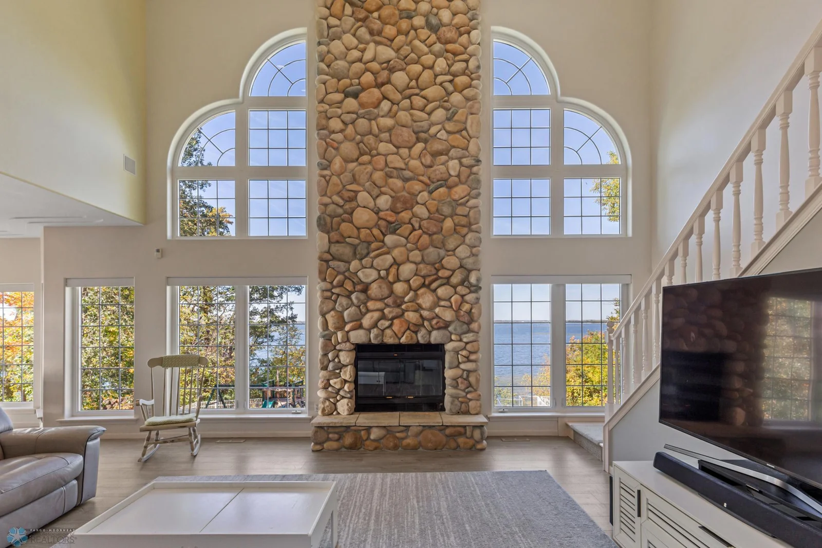 Custom Stone Floor to Ceiling Fireplace