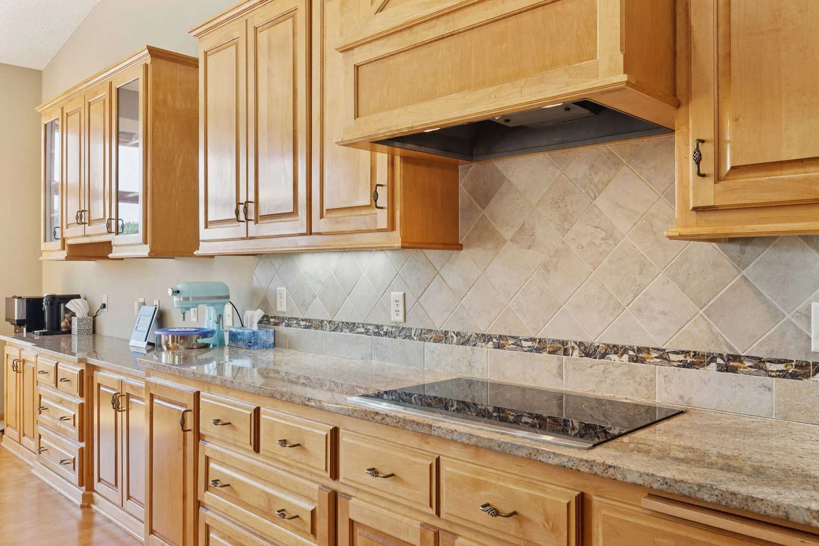 Kitchen has lots of storage & counter space w/new electric cooktop