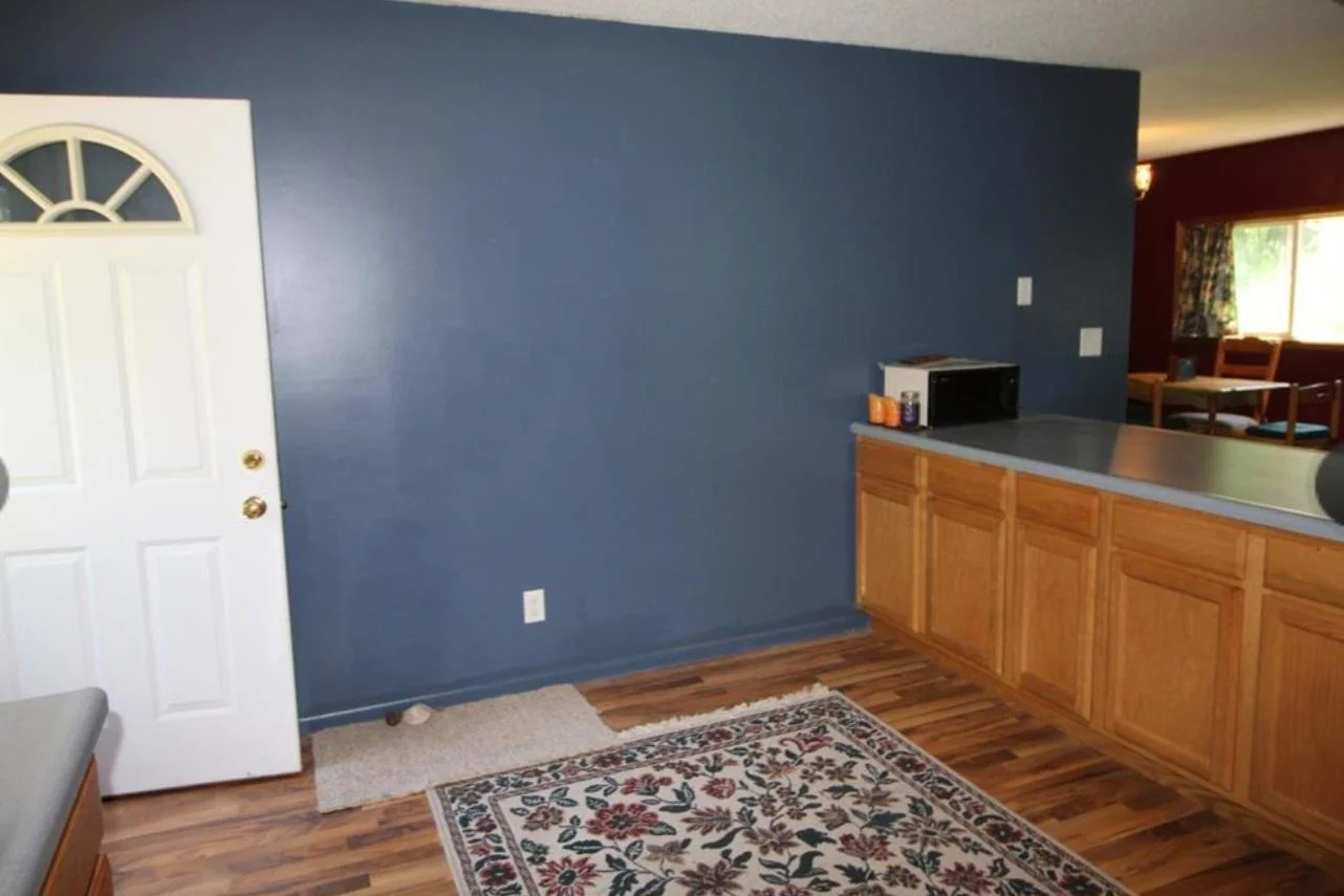 There is room in this kitchen for a smaller table or a center island.