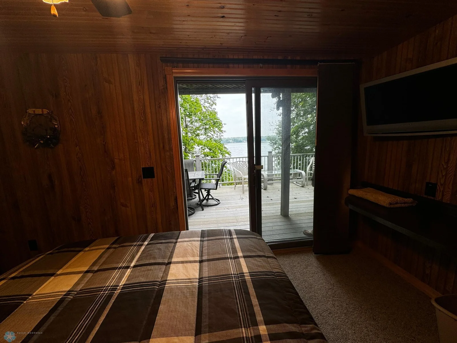Bedroom 3 opens to lower level deck with great view of the lake