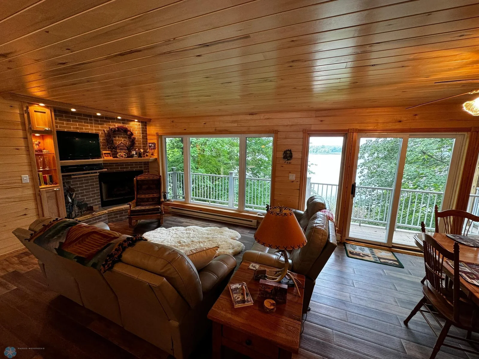 Living Room Overlooks Upper Deck with Gorgeous Views of the Lake!
