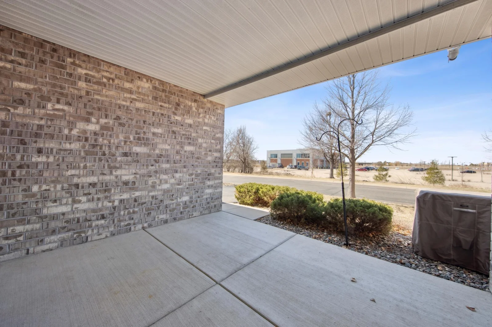 Expansive front patio perfect for enjoying summer nights
