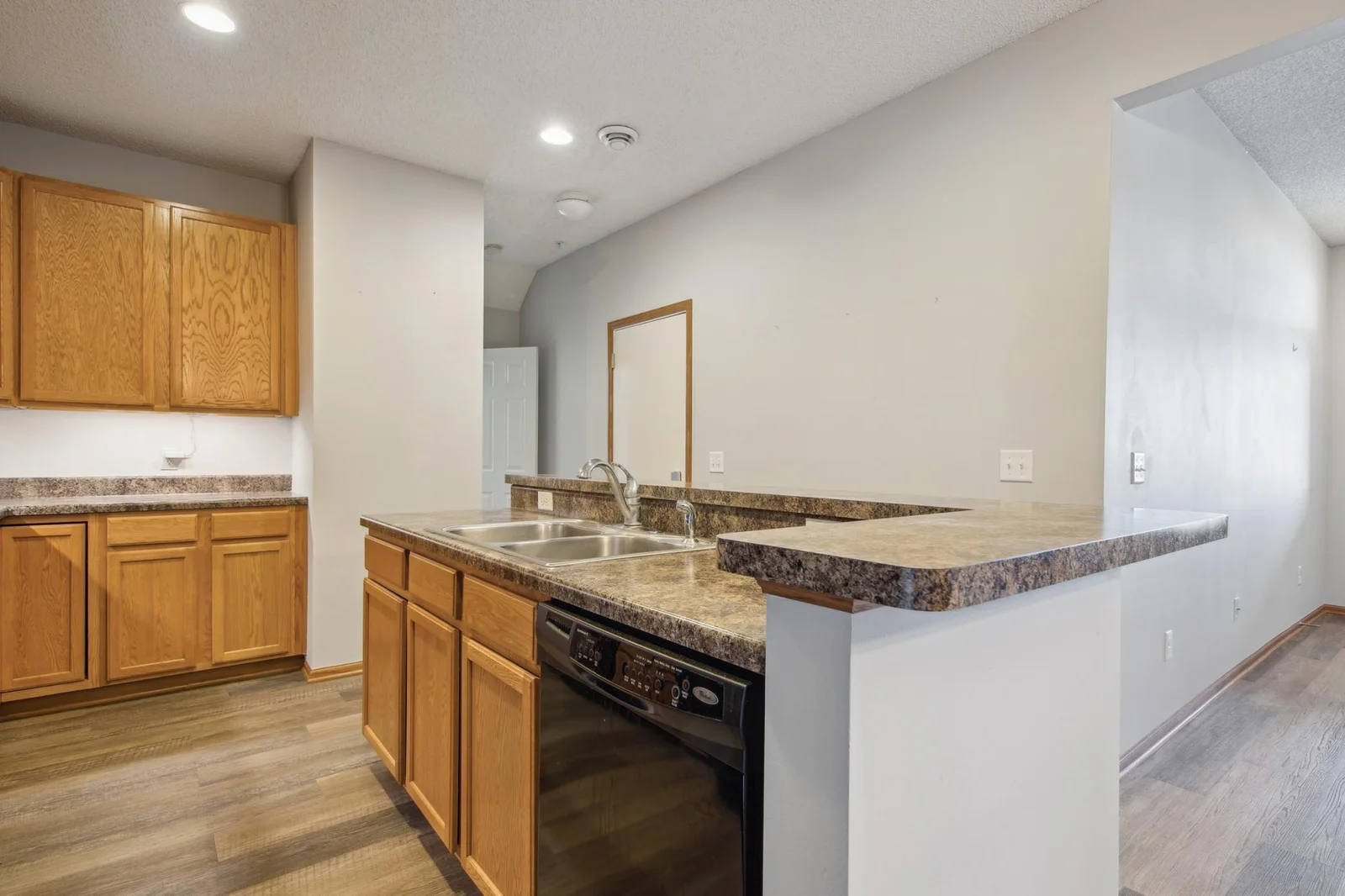 Main level kitchen with a large eat-in center island.
