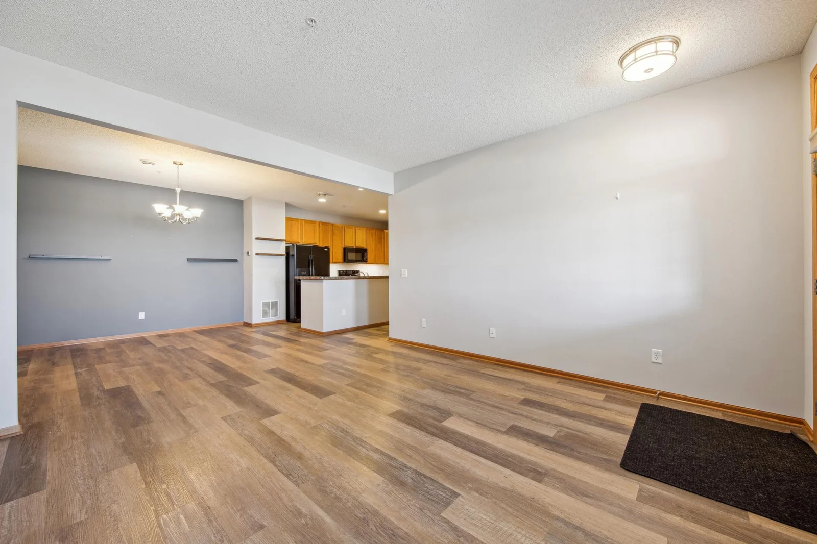 Spacious main level living room and dining room with ample natural light.