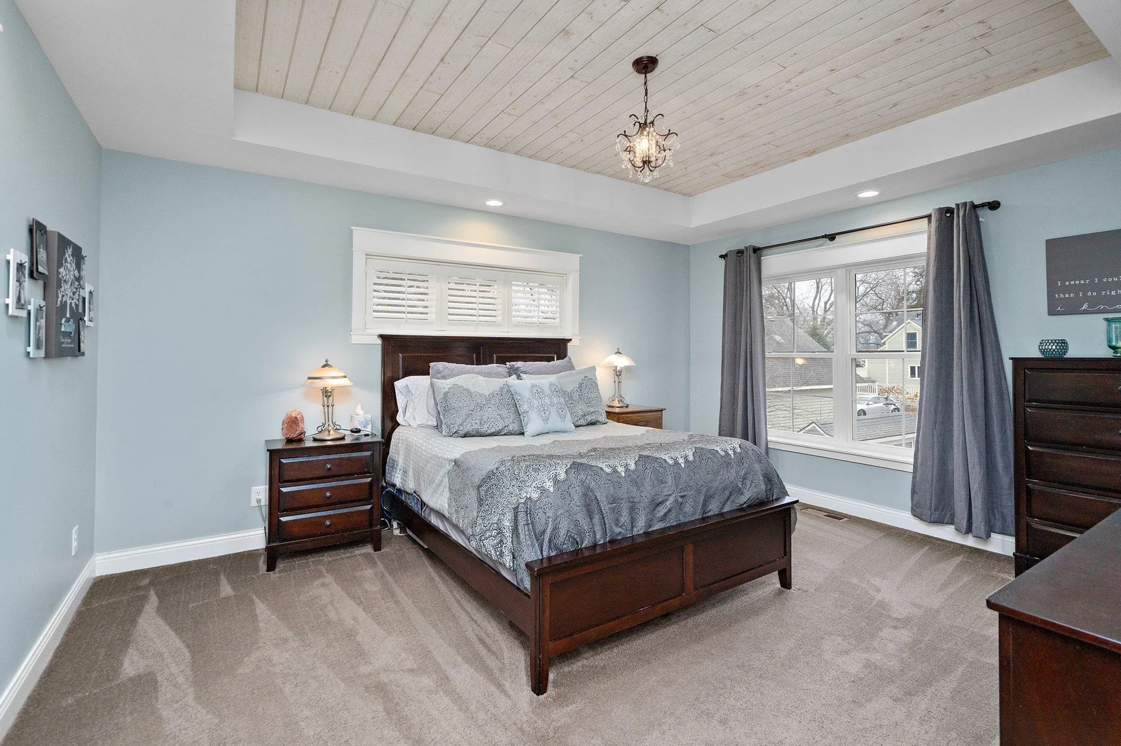The spacious owner’s suite offers tray vault ceiling, center and perimeter lighting, and plenty of space for your furniture!