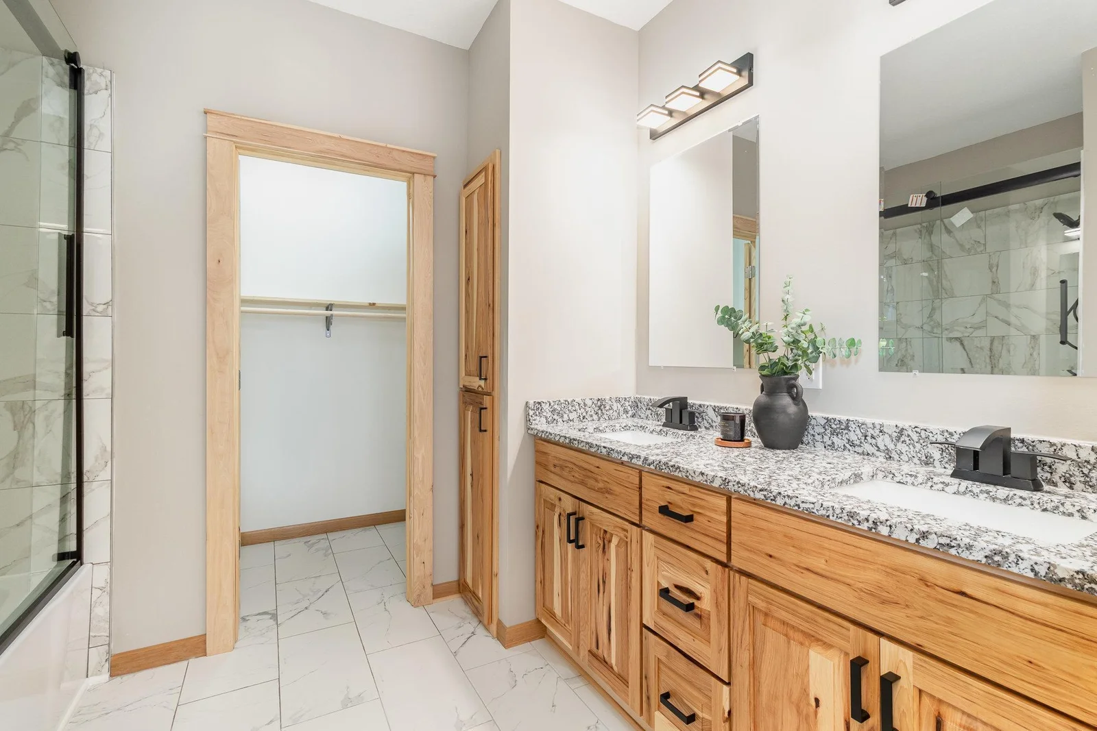 Primary Suite Bathroom with large walk-in closet.