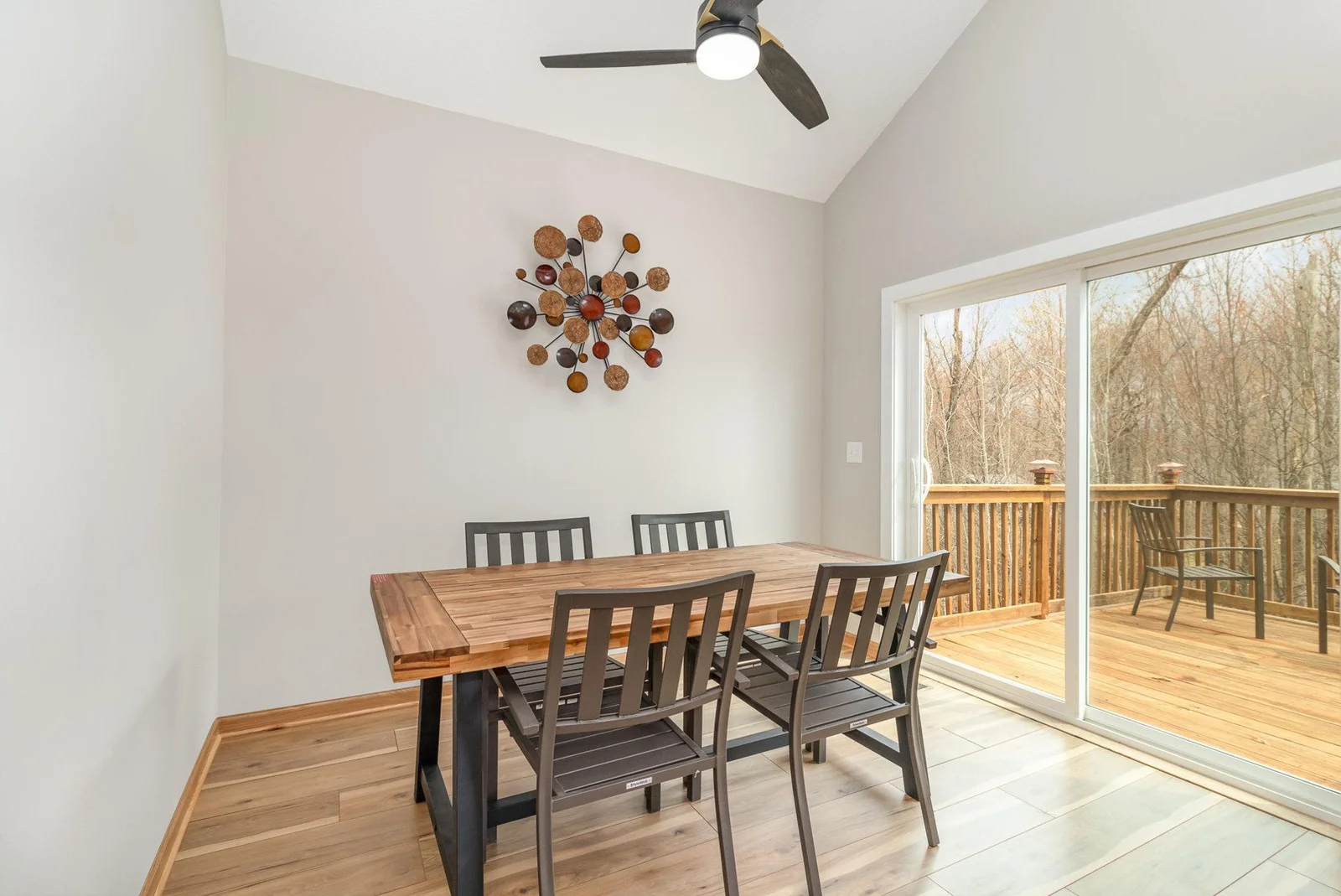 Dining area off of the kitchen leads to large deck with amazing views.