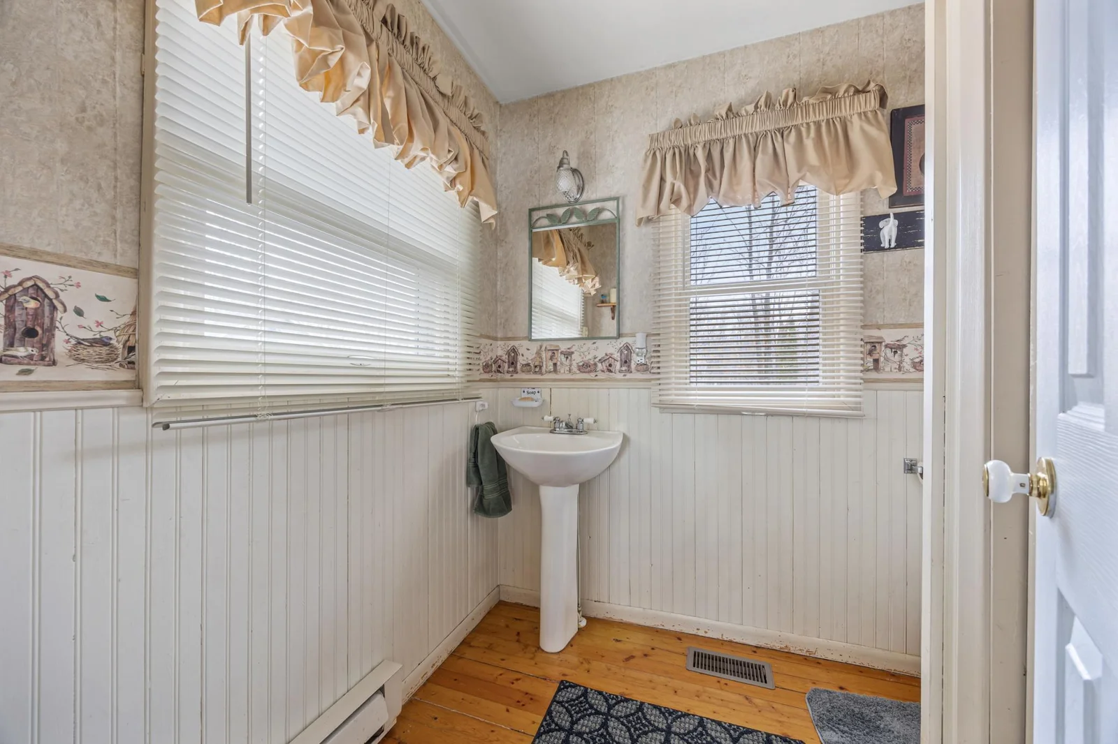 Bath next to the kitchen/dining area