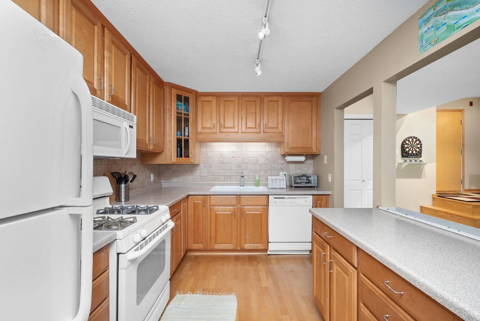 Nice kitchen with a very workable layout. Lots of storage and prep space.