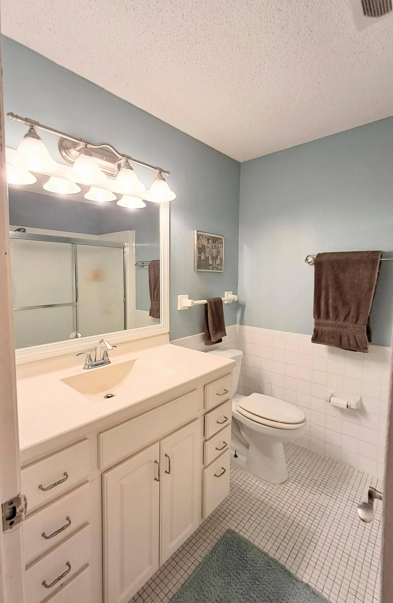 The main full bath is located down the hall near the bedrooms.