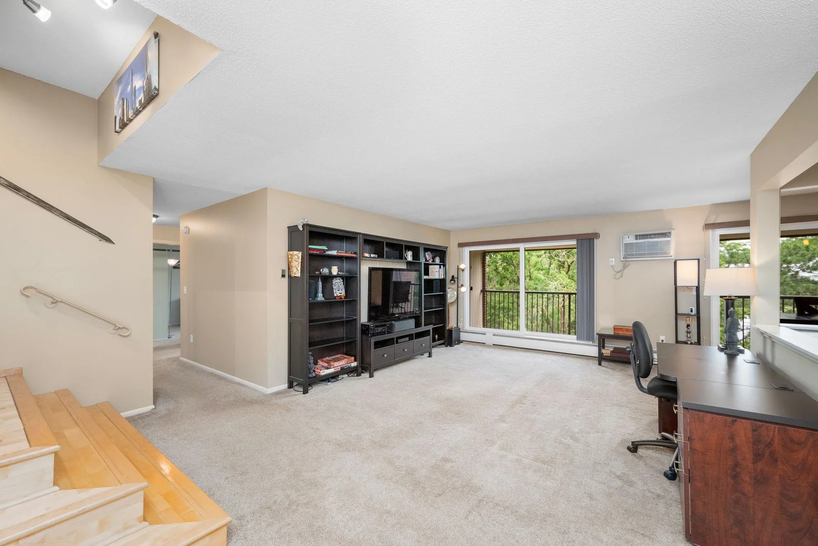 Both Living room and Dining room have doors to the deck