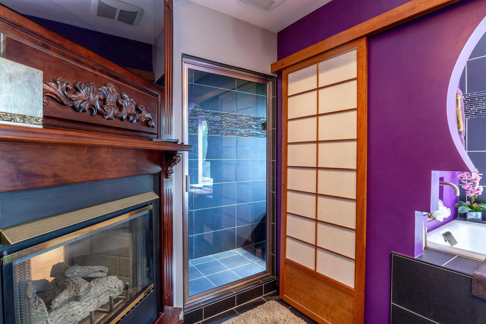 Two-Sided Fireplace in Primary Bedroom and Bath