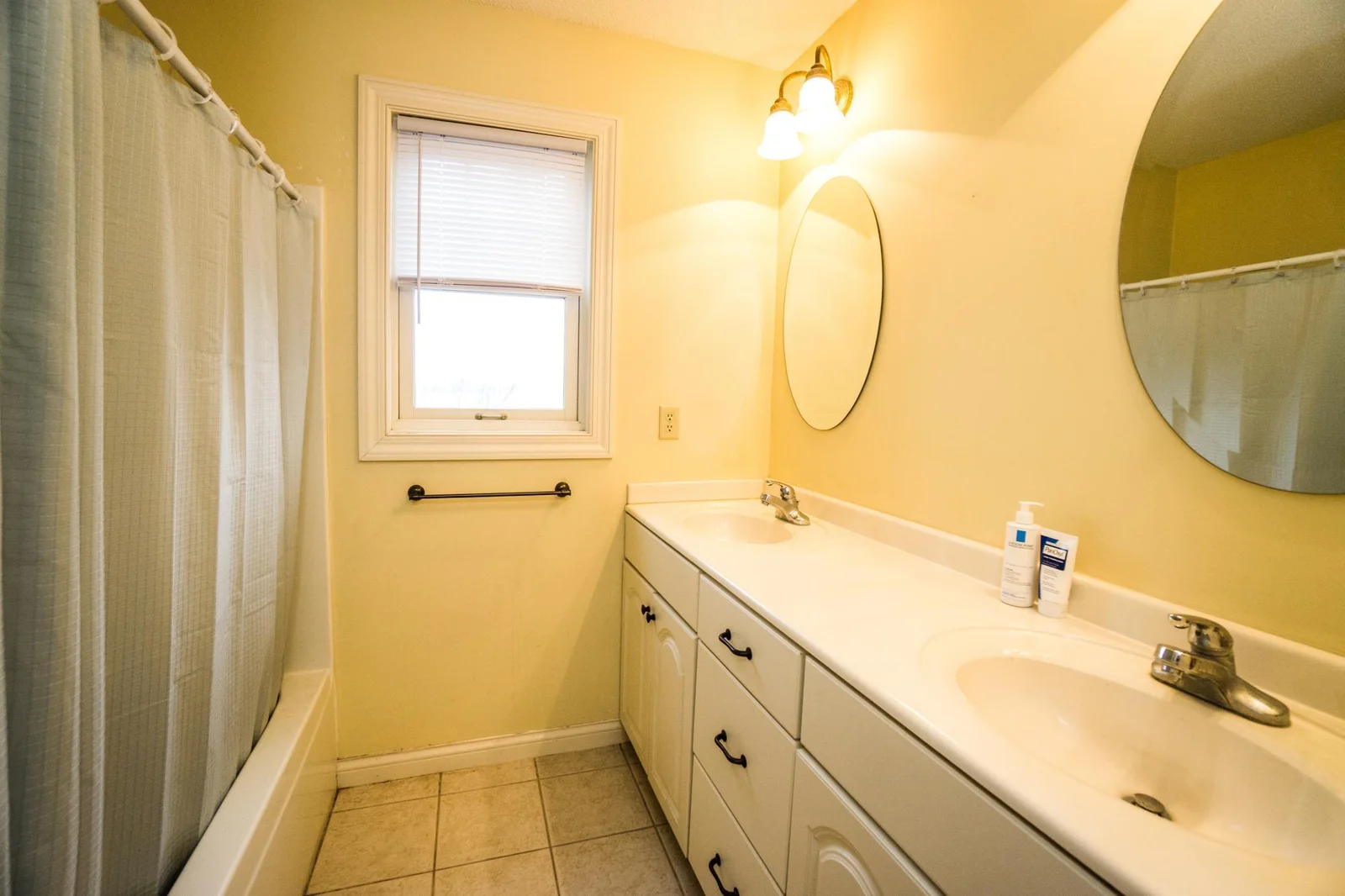 2 of 4 bathrooms has dual sinks.